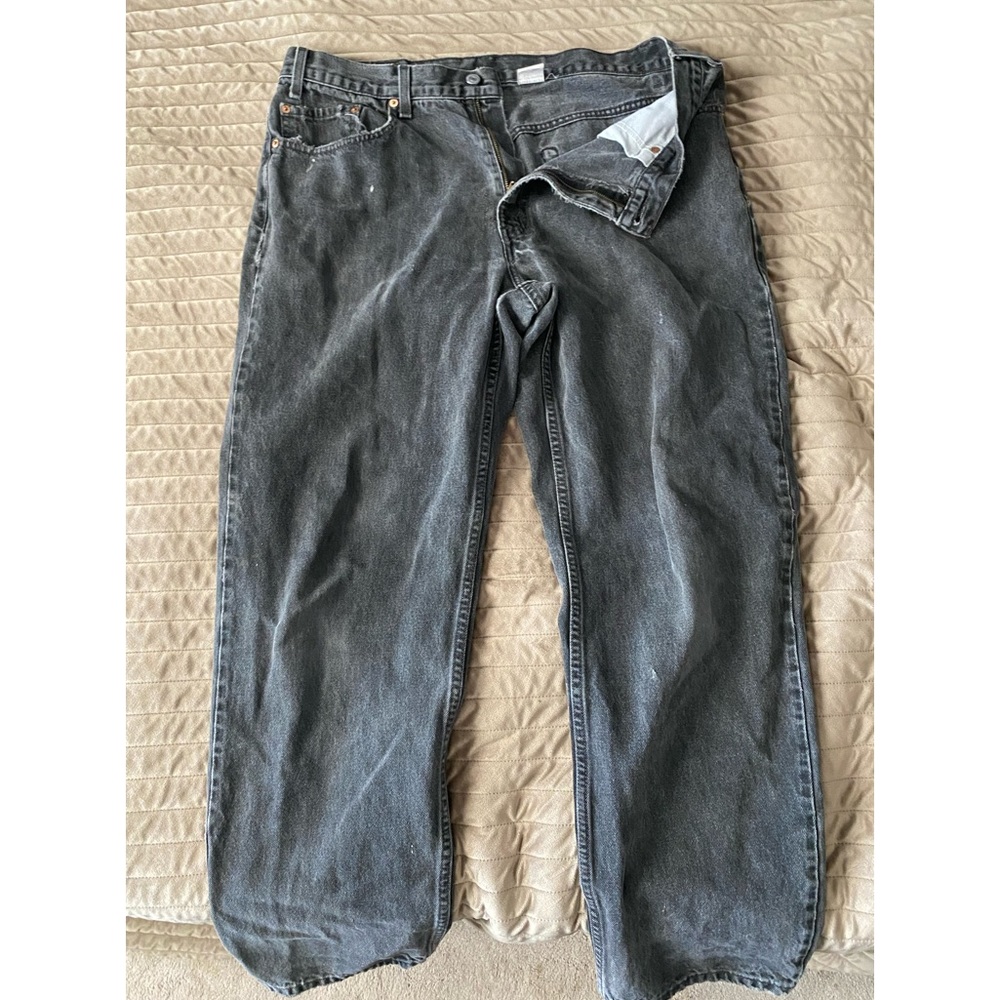 Vintage Levi’s 550 black denim jeans.